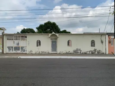 Se vende terreno con casa en duran daigonal a procarsa